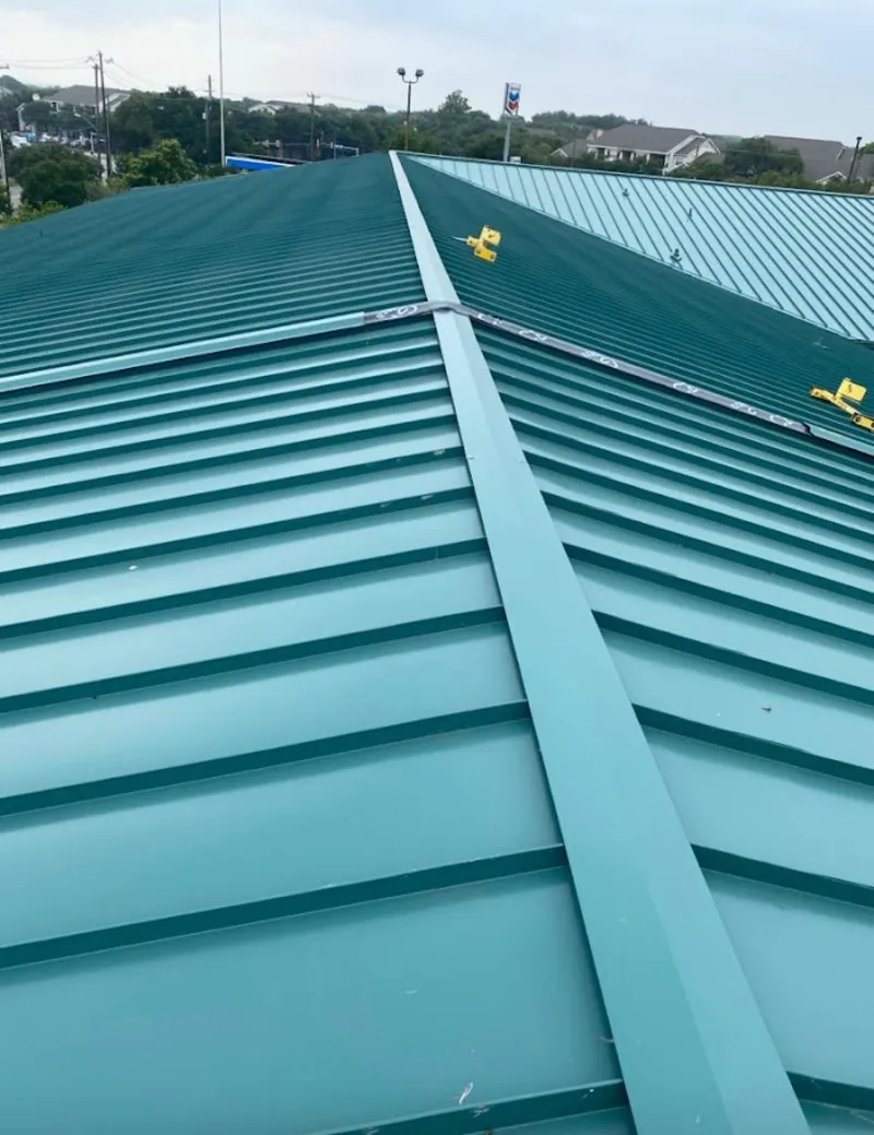 Green commercial metal roof ridge and valley for Metal Roof Repair in Monroe